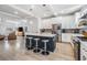 Bright kitchen with stainless steel appliances, center island, and pendant lighting at 6904 S Macdill Ave # 1, Tampa, FL 33611
