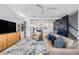 Spacious living room showcasing an open floor plan, comfortable seating, stylish decor and views of other living spaces at 6904 S Macdill Ave # 1, Tampa, FL 33611