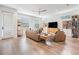 Spacious living area with comfortable seating, natural light, and hardwood floors at 6904 S Macdill Ave # 1, Tampa, FL 33611