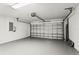 Spacious garage with a door and ample room for parking and storage at 7023 Montauk Point Xing, Bradenton, FL 34212