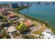 The aerial view displays the property's proximity to the waterfront and city skyline at 7085 Sunset S Dr # A, St Petersburg, FL 33707