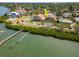 Waterfront property with easy water access, showcasing lush greenery and stunning water views, ideal for tranquil coastal living at 7085 Sunset S Dr # A, St Petersburg, FL 33707