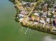 An aerial view of the neighborhood shows the property near the waterfront at 7085 Sunset S Dr # A, St Petersburg, FL 33707