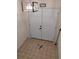 A tiled entryway with double doors and decorative lighting at 7085 Sunset S Dr # A, St Petersburg, FL 33707