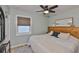 Cozy bedroom features soft colors, wood headboard, and natural light at 716 75Th N St, St Petersburg, FL 33710