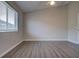 Bedroom with wood-look floors and a ceiling fan at 8531 Trail Wind Dr, Tampa, FL 33647