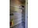 Walk-in closet with sturdy wire shelving for ample storage at 8531 Trail Wind Dr, Tampa, FL 33647