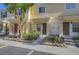 Two story condos with private parking, front garden, and steps to the entrance at 8531 Trail Wind Dr, Tampa, FL 33647