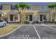 Condos feature private parking with landscaped garden at 8531 Trail Wind Dr, Tampa, FL 33647