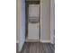 Conveniently located laundry closet with stacked washer and dryer units at 8531 Trail Wind Dr, Tampa, FL 33647
