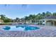 Inviting community pool with spacious deck at 8531 Trail Wind Dr, Tampa, FL 33647
