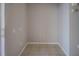 Unfurnished room with neutral paint, tile flooring, and plenty of electrical outlets at 8531 Trail Wind Dr, Tampa, FL 33647