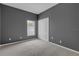 Bedroom with carpeting, a window, and a closet with folding doors at 9644 Jasmine Brook Cir, Land O Lakes, FL 34638