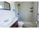 Stylish bathroom with a tiled walk-in shower, modern fixtures, and a vanity sink at 9706 N 22Nd St, Tampa, FL 33612