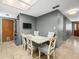 Eat-in kitchen area with modern appliances and a cozy seating area at 10206 N Hyaleah Rd, Tampa, FL 33617