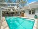 Enjoy the private screened-in pool, storage shed, and tranquil backyard at 10206 N Hyaleah Rd, Tampa, FL 33617