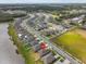 Beautiful aerial view of a Primary-planned community with lake views and manicured lawns at 10433 Alder Green Dr, Riverview, FL 33578