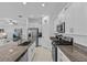Bright kitchen featuring stainless steel appliances, granite countertops and an open layout at 10433 Alder Green Dr, Riverview, FL 33578