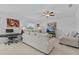 Bright living room featuring tile flooring, and a ceiling fan at 10433 Alder Green Dr, Riverview, FL 33578