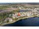Gorgeous aerial shot of the lake community and the home's premium waterfront location at 10506 Sky Flower Ct, Land O Lakes, FL 34638