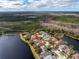 A stunning aerial view showcasing the beautiful community and the home's prime location near the lake at 10506 Sky Flower Ct, Land O Lakes, FL 34638