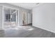 A bright, spacious bedroom with sliding glass door access and an ensuite bathroom at 10506 Sky Flower Ct, Land O Lakes, FL 34638
