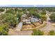 Aerial view of a home showcasing a pool and circular garden in a neighborhood setting at 1111 32Nd N St, St Petersburg, FL 33713