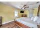 Cozy bedroom features hardwood floors, and natural light, creating a welcoming and comfortable atmosphere at 1111 32Nd N St, St Petersburg, FL 33713