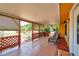 Inviting front porch with comfortable seating, lattice details, and outdoor ambiance at 1111 32Nd N St, St Petersburg, FL 33713