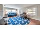Cozy living room with hardwood floors, comfortable seating, and lots of natural light at 1111 32Nd N St, St Petersburg, FL 33713