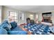 Inviting living room features a cozy fireplace, comfortable seating, and natural light at 1111 32Nd N St, St Petersburg, FL 33713