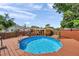 Backyard pool featuring a spacious wood deck, perfect for relaxing and enjoying the outdoors at 1111 32Nd N St, St Petersburg, FL 33713
