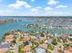 A picturesque aerial view of waterfront homes with access to the surrounding waterways at 1141 80Th Street S Ct, St Petersburg, FL 33707