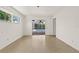 Bright bedroom featuring sliding glass doors to the pool and lots of natural light at 1141 80Th Street S Ct, St Petersburg, FL 33707