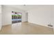 Bright bedroom featuring sliding glass doors to the pool and lots of natural light at 1141 80Th Street S Ct, St Petersburg, FL 33707