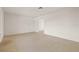 Spacious living room with neutral colors and tile flooring at 1141 80Th Street S Ct, St Petersburg, FL 33707