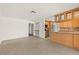 Bright and airy living room adjacent to an eat-in kitchen with tile flooring at 1141 80Th Street S Ct, St Petersburg, FL 33707