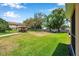 A lush backyard and a charming gazebo on a sunny day at 11611 Mango Ridge Blvd, Seffner, FL 33584