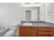 A bathroom with a single sink vanity, a toilet, and a bath tub combo at 11611 Mango Ridge Blvd, Seffner, FL 33584