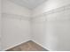 Walk-in closet provides ample storage with wire shelving installed at 11611 Mango Ridge Blvd, Seffner, FL 33584