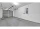 Spacious two car garage offering ample space for parking and storage with an automatic garage door at 11611 Mango Ridge Blvd, Seffner, FL 33584