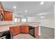 Modern kitchen features stainless steel appliances, ample storage, and opens to the living area at 11611 Mango Ridge Blvd, Seffner, FL 33584