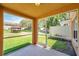 An enclosed outdoor patio space that looks out onto the backyard at 11611 Mango Ridge Blvd, Seffner, FL 33584