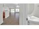 View of the powder room sink with living room in the background at 11611 Mango Ridge Blvd, Seffner, FL 33584