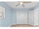 Bedroom showing the closet and flooring at 12400 Park Blvd # 210, Seminole, FL 33772