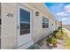 Inviting entryway of home featuring brick detail and lush landscaping at 12400 Park Blvd # 210, Seminole, FL 33772