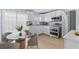 Eat-in kitchen featuring stainless steel appliances and tile backsplash at 12400 Park Blvd # 210, Seminole, FL 33772
