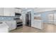 Spacious kitchen with modern appliances and quartz countertops at 12400 Park Blvd # 210, Seminole, FL 33772