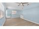 Bright living room with new floors and paint at 12400 Park Blvd # 210, Seminole, FL 33772