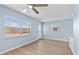 Bright living room with new floors and paint at 12400 Park Blvd # 210, Seminole, FL 33772